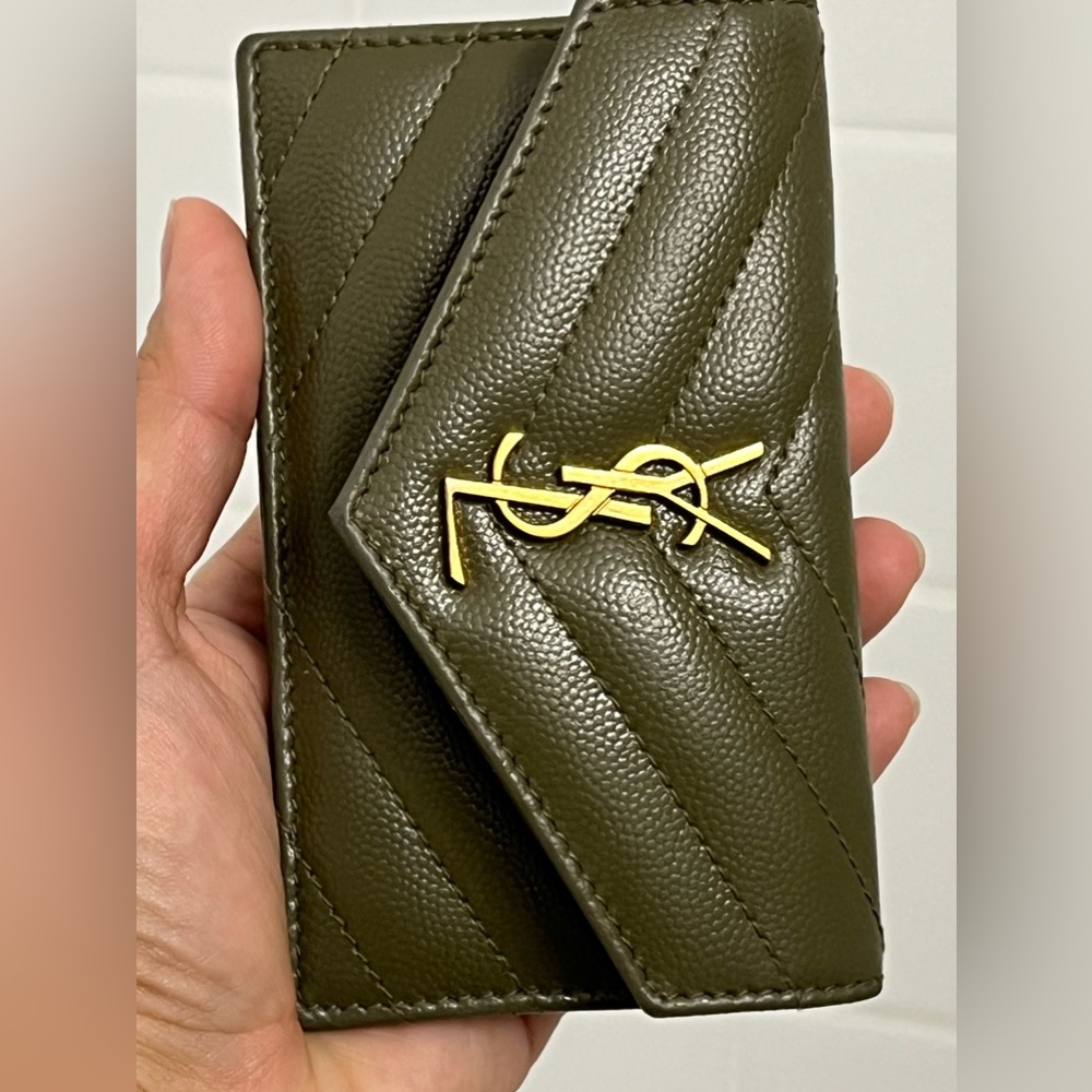 SOLD OFF POSHMARK 
Cassandre YSL Monogram Leather Zip Card Holder - Picture 10 of 16